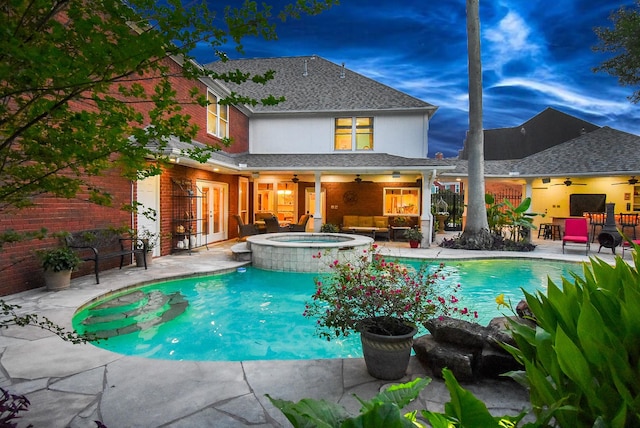 14 Wickham Ct, Sugar Land, TX 77479 - view of swimming pool with a ceiling fan, a patio area, a pool with connected hot tub, and french doors
