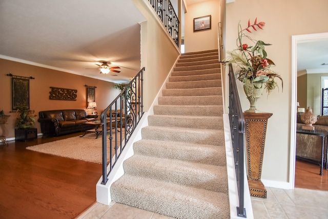 14 Wickham Ct, Sugar Land, TX 77479 - stairs with ceiling fan, crown molding, and baseboards
