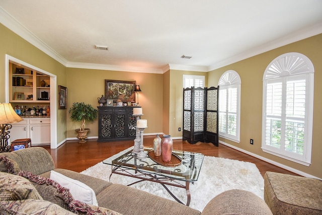 14 Wickham Ct, Sugar Land, TX 77479 - living room with wood finished floors, ornamental molding, and baseboards