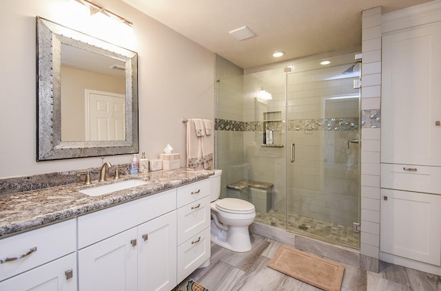 14 Wickham Ct, Sugar Land, TX 77479 - full bathroom with toilet, vanity, a stall shower, and recessed lighting