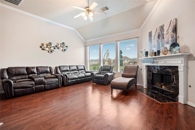 4635 Countrymeadows Dr, Spring, TX 77388 - living room featuring lofted ceiling, wood finished floors, a high end fireplace, crown molding, and ceiling fan