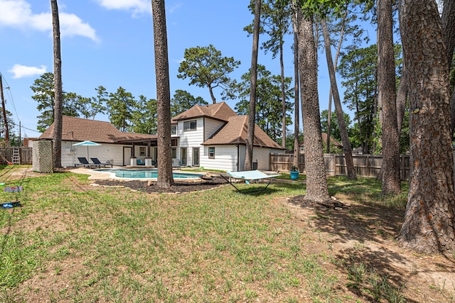 15115 Gladebrook Dr, Houston, TX 77068 - rear view of house featuring a patio