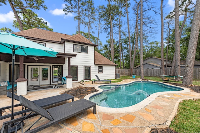 15115 Gladebrook Dr, Houston, TX 77068 - view of pool with french doors, a fenced backyard, a patio area, a ceiling fan, and central AC
