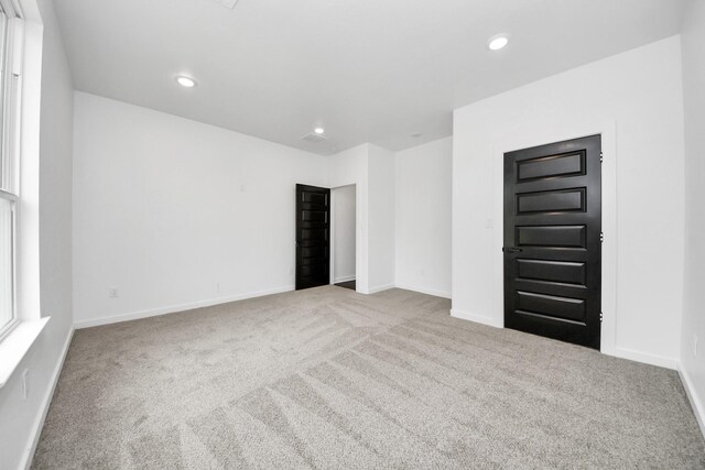 1029 Gazing Pine St, Huffman, TX 77336 - spare room with carpet, baseboards, and recessed lighting
