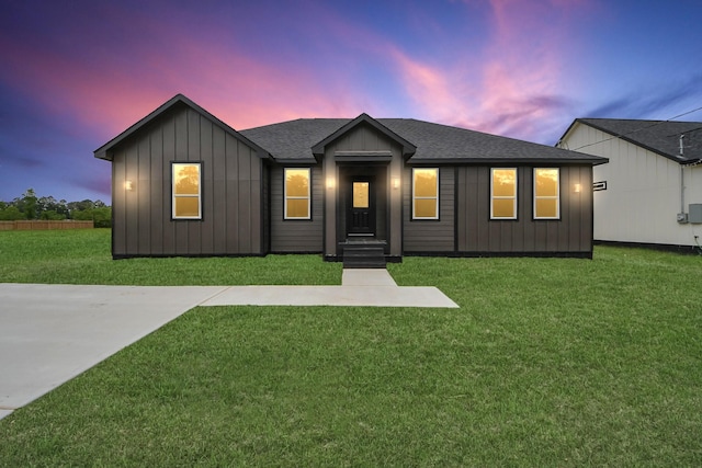 1029 Gazing Pine St, Huffman, TX 77336 - ranch-style home with board and batten siding, a lawn, and a shingled roof