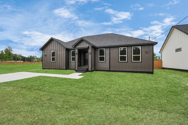 1029 Gazing Pine St, Huffman, TX 77336 - view of front of house with board and batten siding and a shingled roof