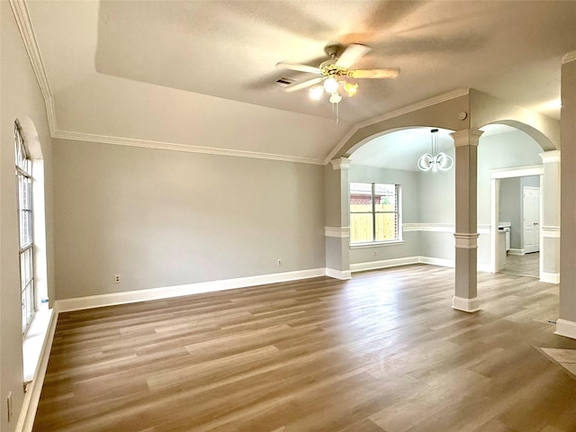 5223 Mountain Forest Dr, Katy, TX 77449 - empty room with arched walkways, decorative columns, a ceiling fan, baseboards, and crown molding