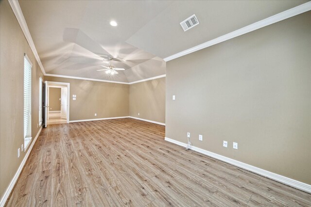 empty room featuring ceiling fan, crown molding, wood finished floors, baseboards, and recessed lighting