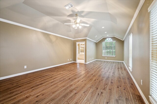 additional living space featuring lofted ceiling, ceiling fan, wood finished floors, baseboards, and recessed lighting