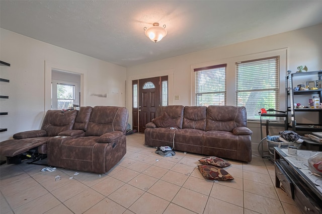 living area featuring light tile patterned floors