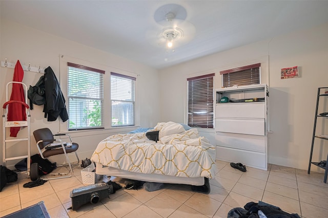 bedroom featuring light tile patterned floors