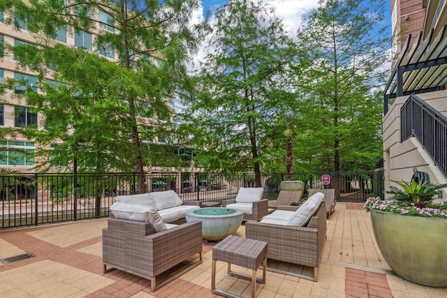 1 Waterway Ct Unit 4B, The Woodlands, TX 77380 - deck featuring an outdoor hangout area, a patio area, fence, and a playground