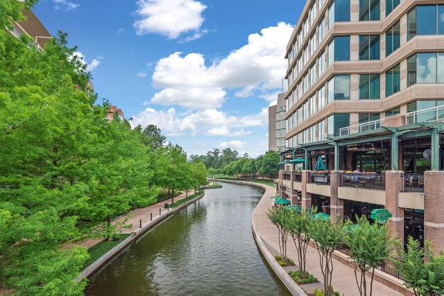 1 Waterway Ct Unit 4B, The Woodlands, TX 77380 - surrounding community with a water view