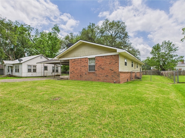 back of house featuring brick siding