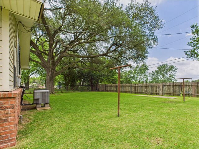 view of yard featuring central AC