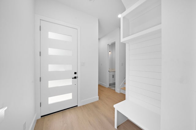 1307 Amundsen St N, Houston, TX 77009 - foyer entrance with light wood-style flooring and baseboards