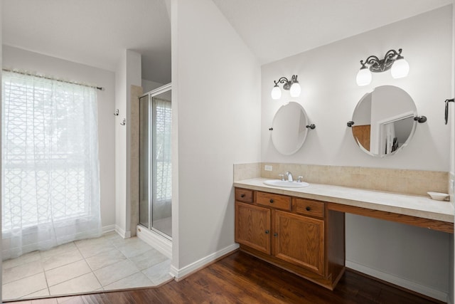 34334 Howell Rd, Waller, TX 77484 - full bathroom featuring a stall shower, vanity, and wood finished floors