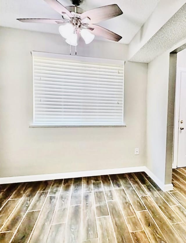 2112 Greenbriar Colony Dr, Houston, TX 77032 - empty room featuring wood finished floors, baseboards, and ceiling fan
