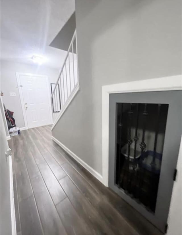 2112 Greenbriar Colony Dr, Houston, TX 77032 - stairs with wood finished floors and baseboards