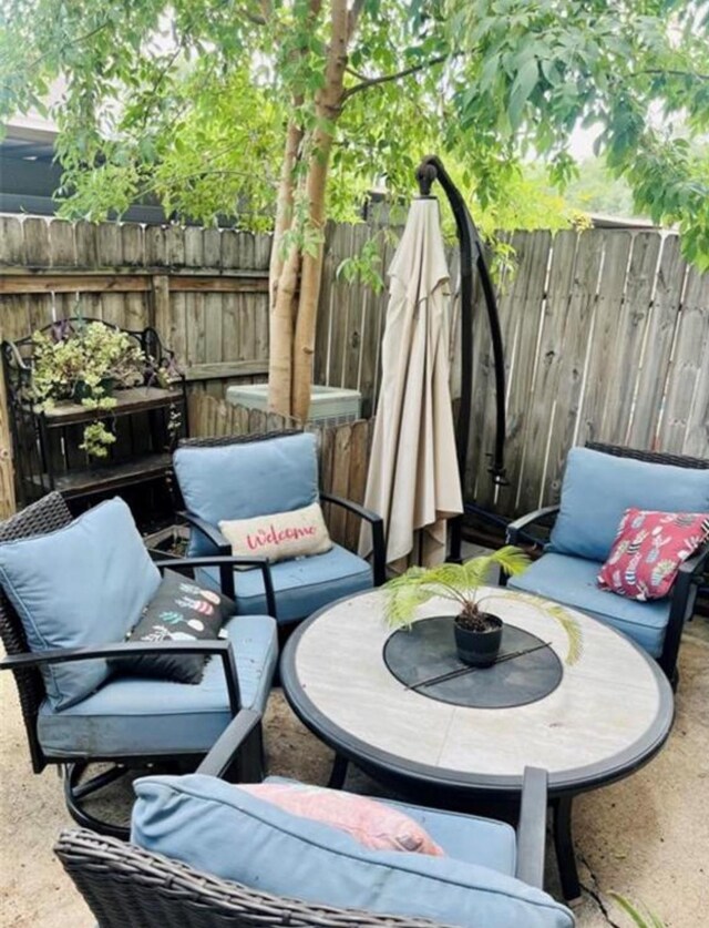 2112 Greenbriar Colony Dr, Houston, TX 77032 - view of patio featuring fence and an outdoor living space