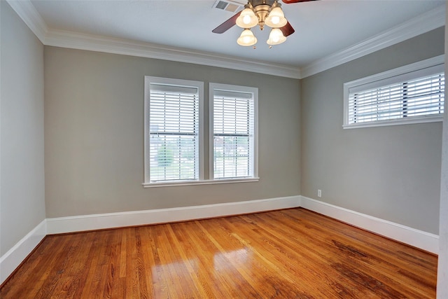 2709 Blodgett St, Houston, TX 77004 - spare room featuring ceiling fan, wood finished floors, and crown molding