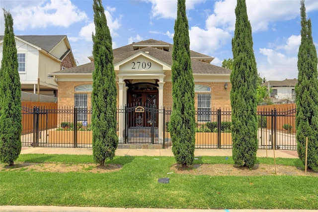 2709 Blodgett St, Houston, TX 77004 - view of front of house with brick siding and a shingled roof
