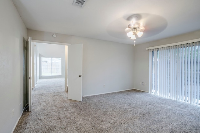 12210 Innsbruk Ct, Houston, TX 77066 - spare room with carpet, ceiling fan, and baseboards