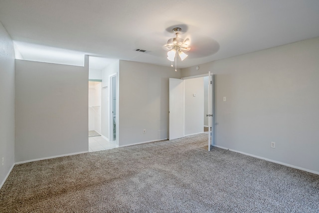 12210 Innsbruk Ct, Houston, TX 77066 - spare room with light carpet, a ceiling fan, and baseboards