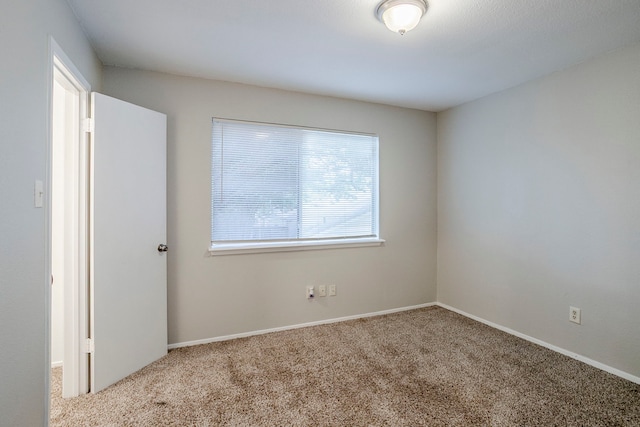 12210 Innsbruk Ct, Houston, TX 77066 - carpeted empty room featuring baseboards