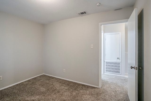 12210 Innsbruk Ct, Houston, TX 77066 - spare room with carpet flooring, baseboards, and a smoke detector