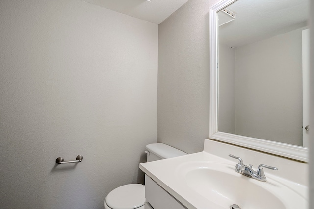 12210 Innsbruk Ct, Houston, TX 77066 - bathroom featuring toilet and vanity