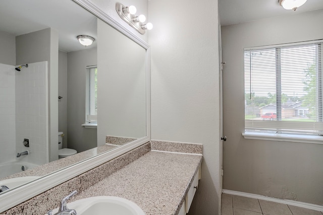 12210 Innsbruk Ct, Houston, TX 77066 - bathroom with tile patterned flooring, toilet, vanity, and bathtub / shower combination