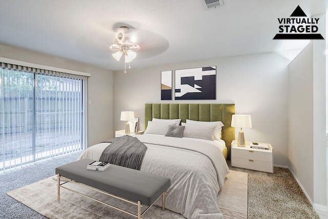 12210 Innsbruk Ct, Houston, TX 77066 - carpeted bedroom featuring access to exterior, baseboards, and ceiling fan