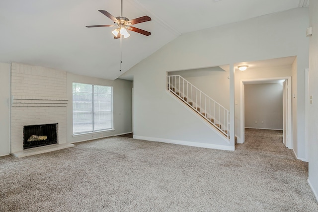 12210 Innsbruk Ct, Houston, TX 77066 - unfurnished living room featuring a ceiling fan, carpet floors, vaulted ceiling, stairway, and a brick fireplace