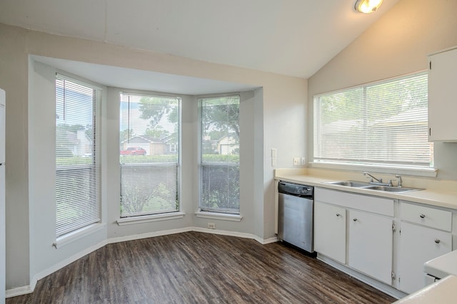 12210 Innsbruk Ct, Houston, TX 77066 - kitchen featuring dishwasher, a sink, dark wood-style floors, lofted ceiling, and white cabinets