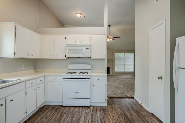 12210 Innsbruk Ct, Houston, TX 77066 - kitchen with white appliances, dark wood-style flooring, ceiling fan, white cabinets, and light countertops