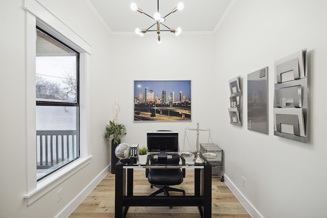 2611 Morrison St, Houston, TX 77009 - office area with ornamental molding, a chandelier, plenty of natural light, and light wood finished floors