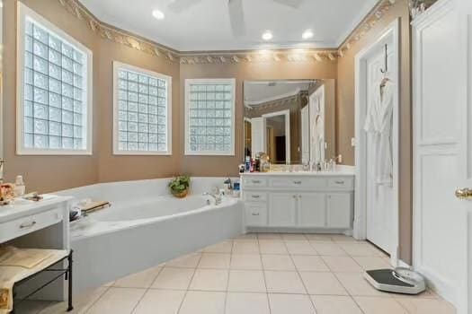2 Argonne Pl, The Woodlands, TX 77382 - full bathroom featuring a garden tub, vanity, and recessed lighting