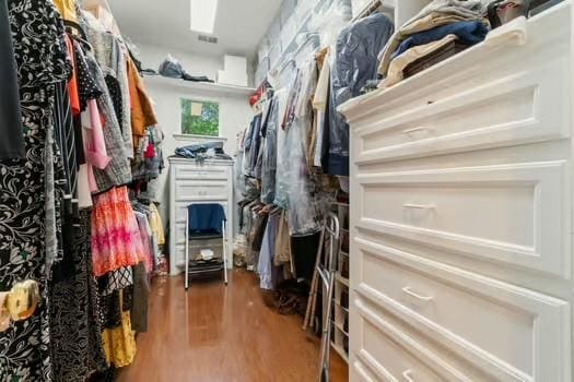 2 Argonne Pl, The Woodlands, TX 77382 - spacious closet featuring wood finished floors