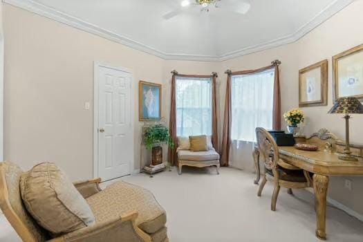 2 Argonne Pl, The Woodlands, TX 77382 - living area featuring a ceiling fan, ornamental molding, and light colored carpet
