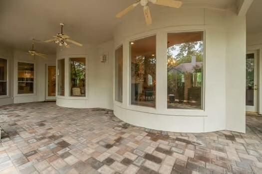 2 Argonne Pl, The Woodlands, TX 77382 - view of patio / terrace featuring ceiling fan