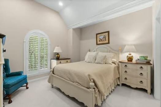 2 Argonne Pl, The Woodlands, TX 77382 - bedroom with light carpet and vaulted ceiling