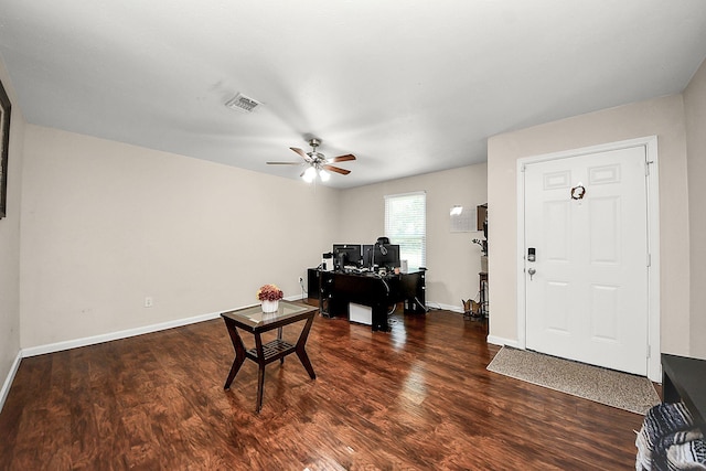 foyer entrance featuring wood finished floors, ceiling fan, and baseboards