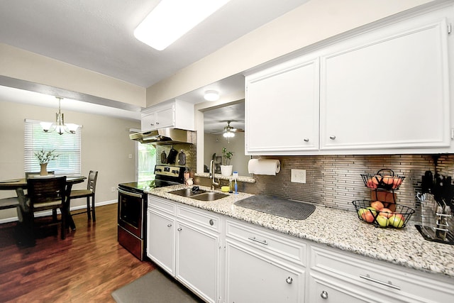 kitchen with stainless steel electric range oven, a sink, under cabinet range hood, decorative backsplash, and white cabinets