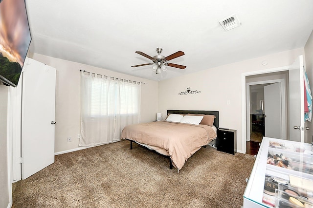 carpeted bedroom with baseboards and ceiling fan