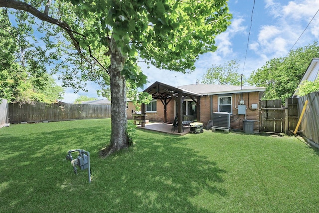 back of house featuring cooling unit, a patio, and a gazebo