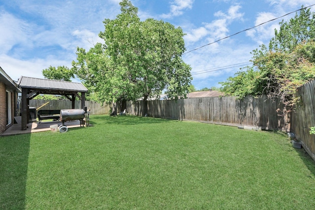 view of yard with a gazebo and a patio area