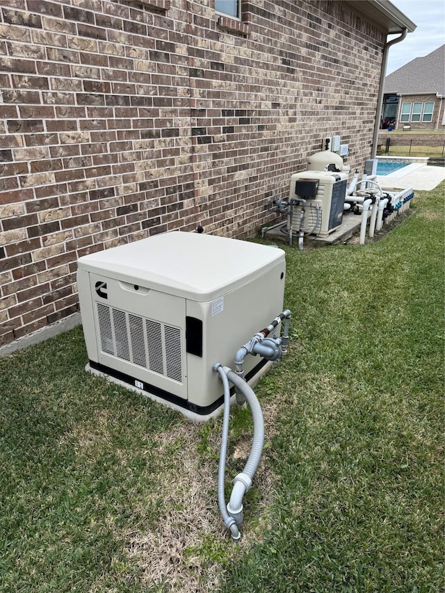 24130 Cannon Anello Ct, Katy, TX 77493 - exterior view of a power unit, brick siding, and fence