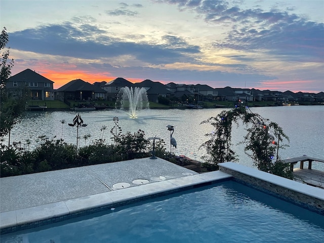 24130 Cannon Anello Ct, Katy, TX 77493 - view of swimming pool with a water view and a residential view