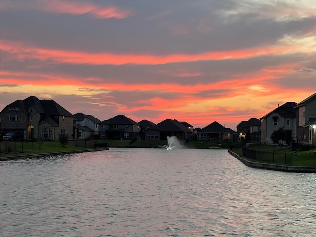 24130 Cannon Anello Ct, Katy, TX 77493 - water view with nearby suburban area and fence